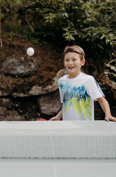 Children play table tennis
