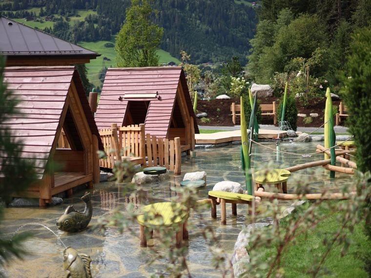 Water playground with lake house and balancing paths